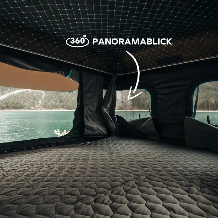 Naturbummler Dachzelt Flitzer 1 XL mit Hartschale und einem 360° Panoramablick über den See.